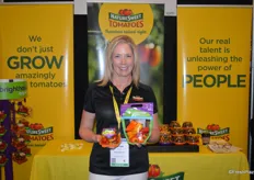 Heather White with NatureSweet shows a tomato medley and sweet mini peppers from the company’s Brighthouse Organics line.